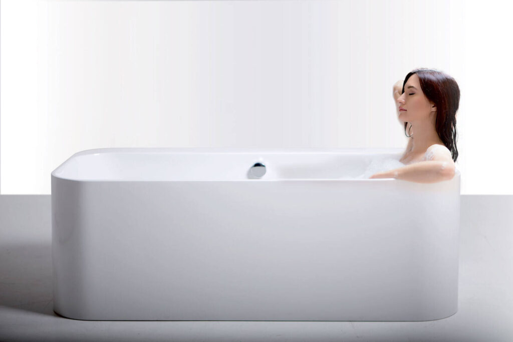 Bathroom fitting by Bathurst & Co: a freestanding bath fitted in a period bathroom